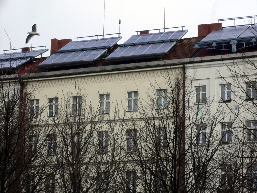 Solar panels on top of buildings.