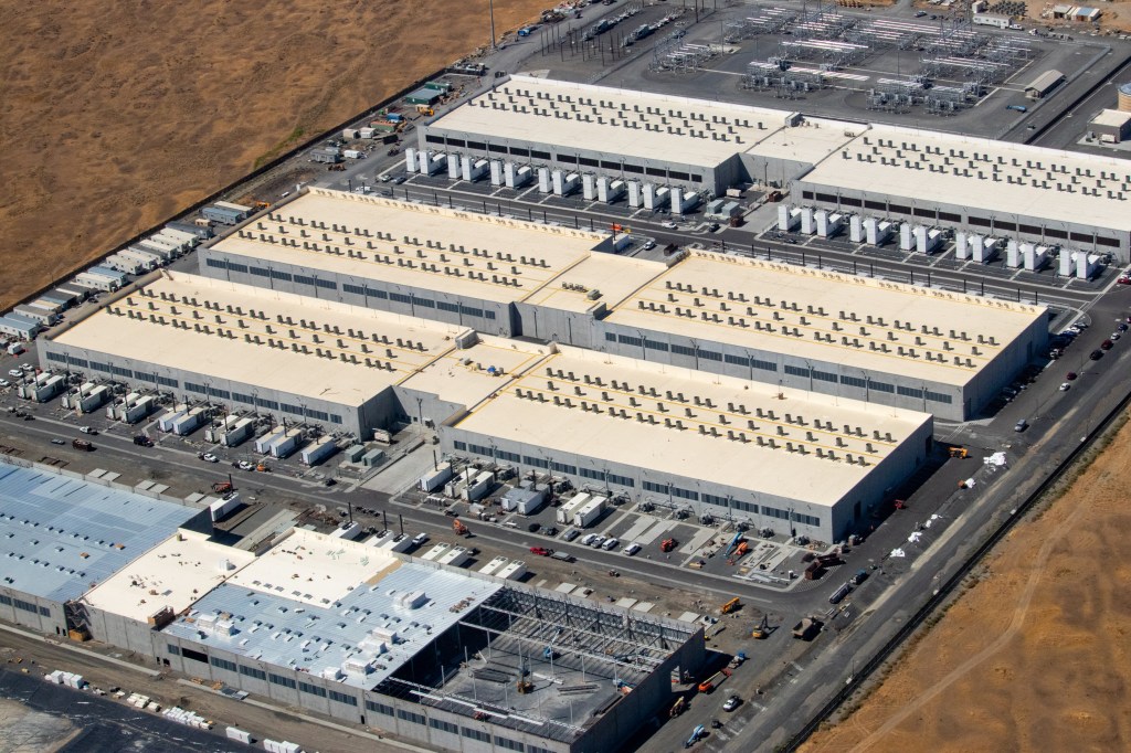 Part of AWS's us-west-2 availability zone, showing three datacenters with a fourth under construction.